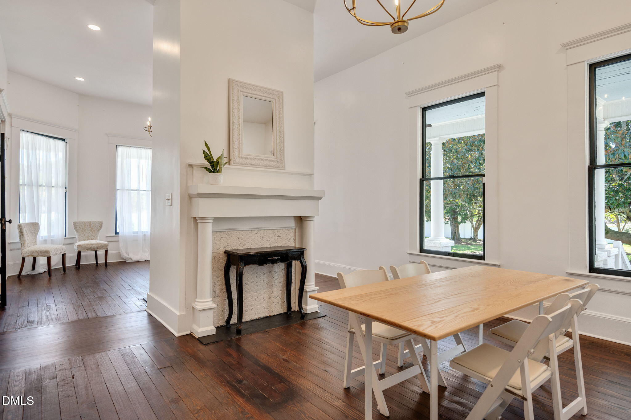 2239 Barber Mill Road Clayton, NC 27520 - Photo 33 of 75 a view of a dining room with furniture window and wooden floor