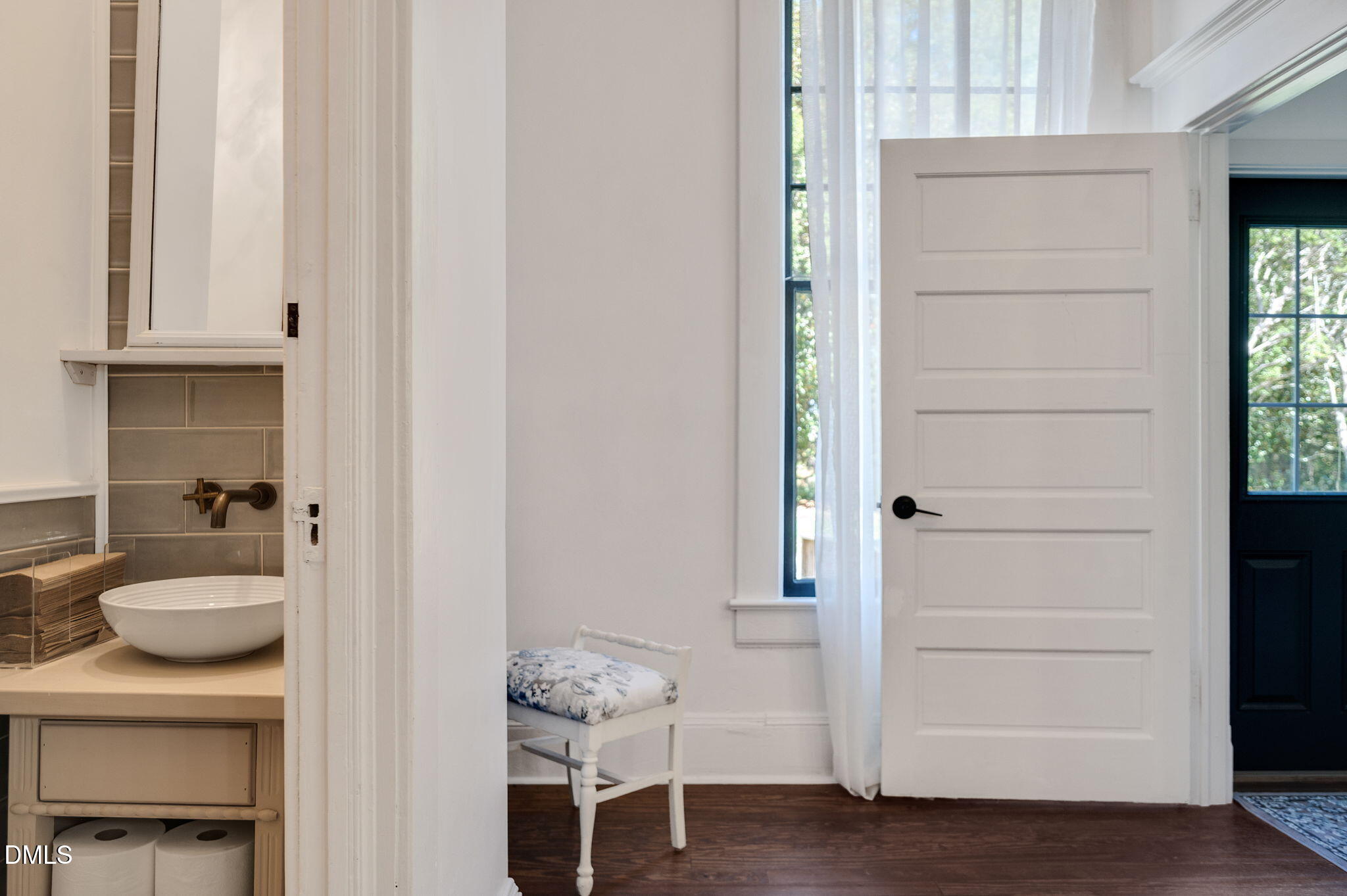2239 Barber Mill Road Clayton, NC 27520 - Photo 42 of 75 a bathroom with a sink and a mirror