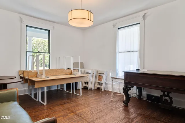an aerial view of a house with swimming pool