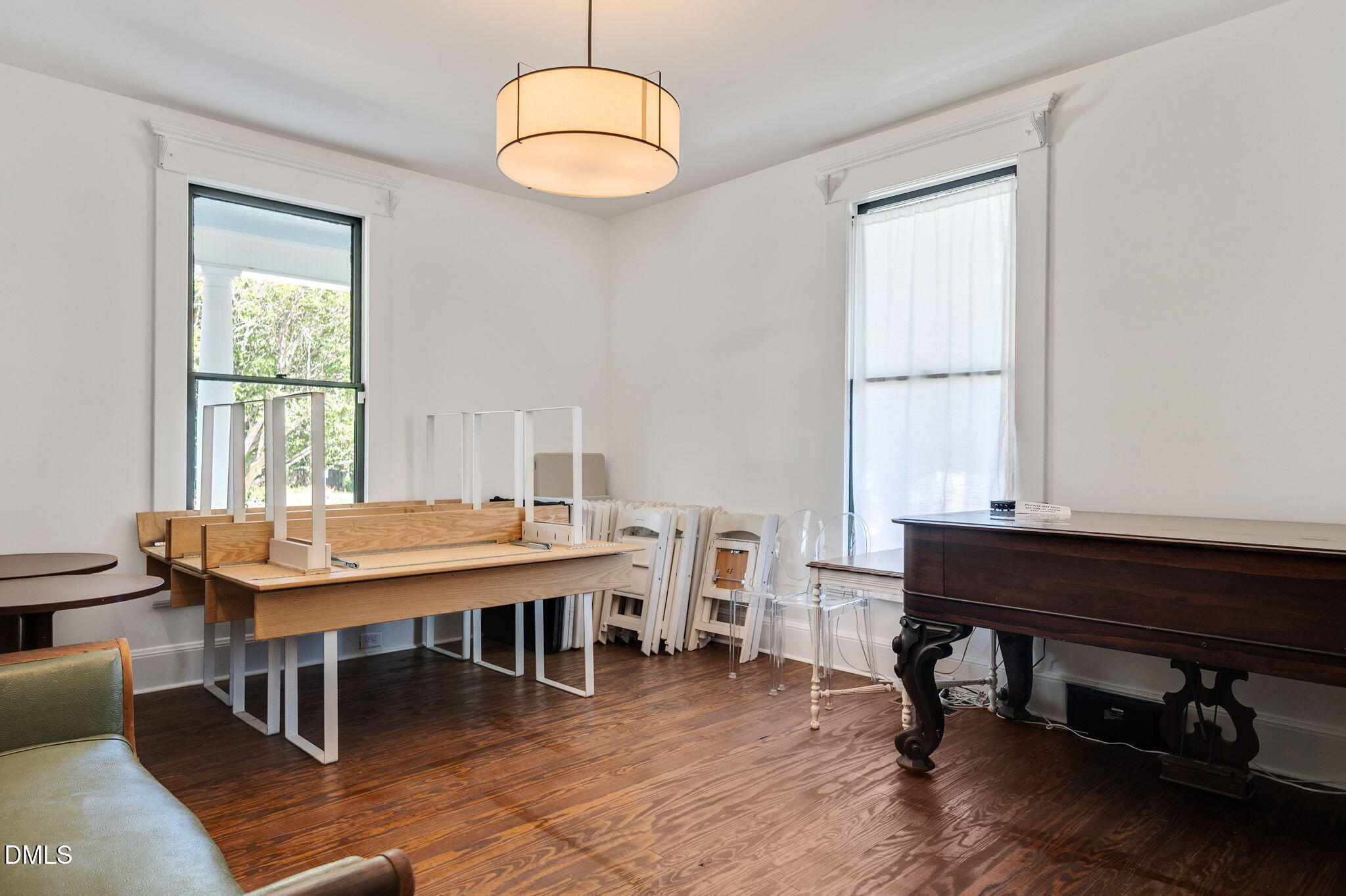 2239 Barber Mill Road Clayton, NC 27520 - Photo 46 of 75 a room with wooden table and windows