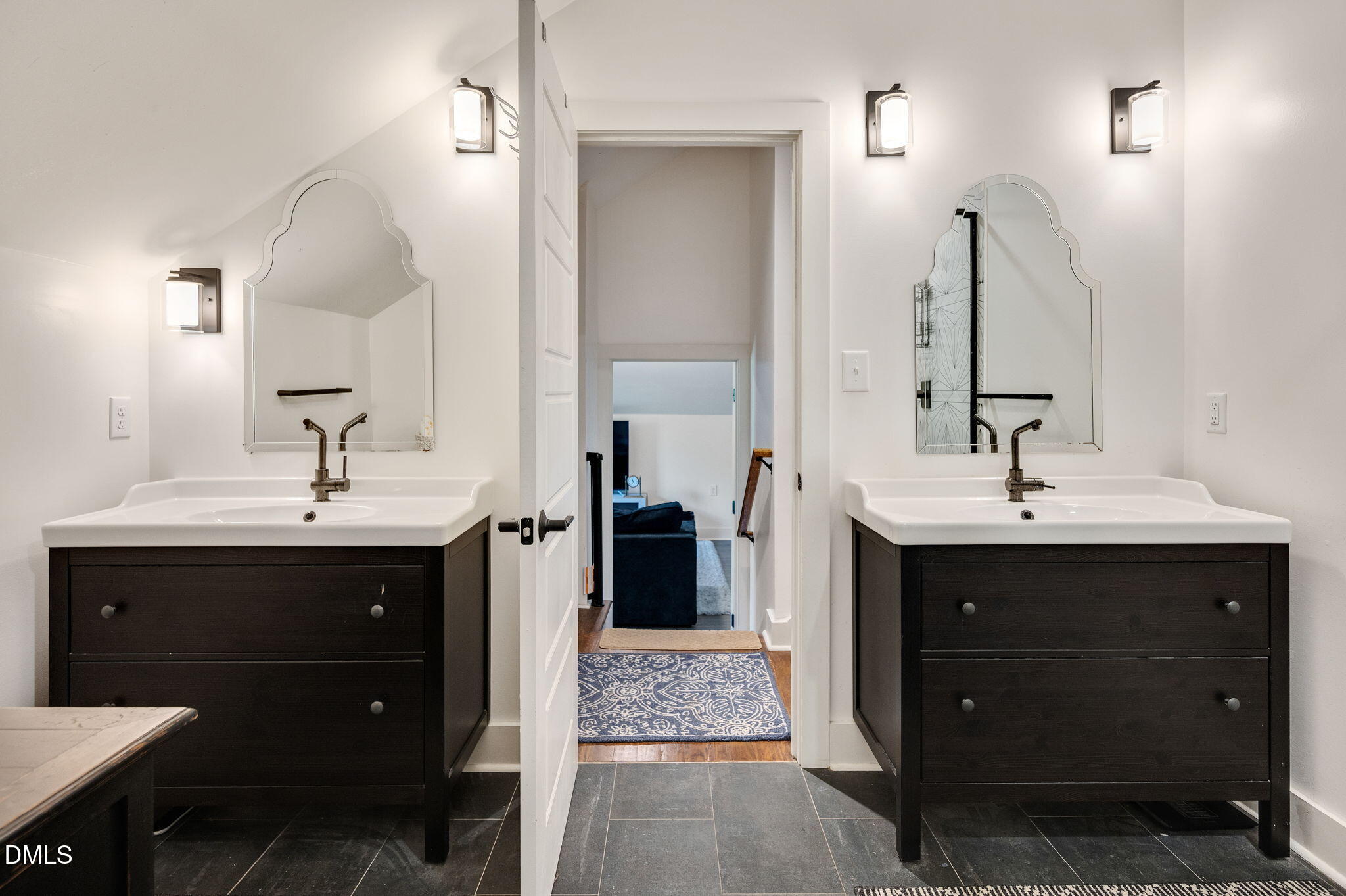 2239 Barber Mill Road Clayton, NC 27520 - Photo 51 of 75 a bathroom with a sink and a mirror