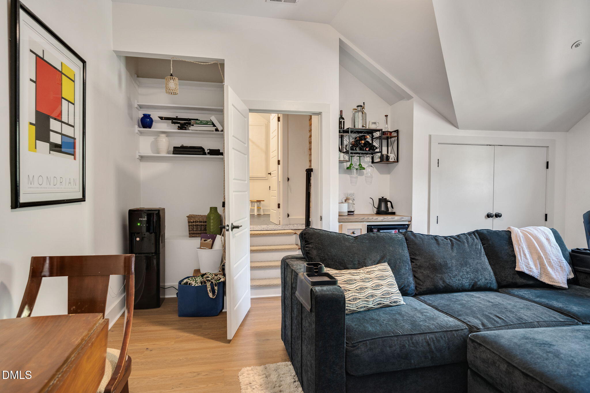2239 Barber Mill Road Clayton, NC 27520 - Photo 53 of 75 a living room with furniture and painting on the wall