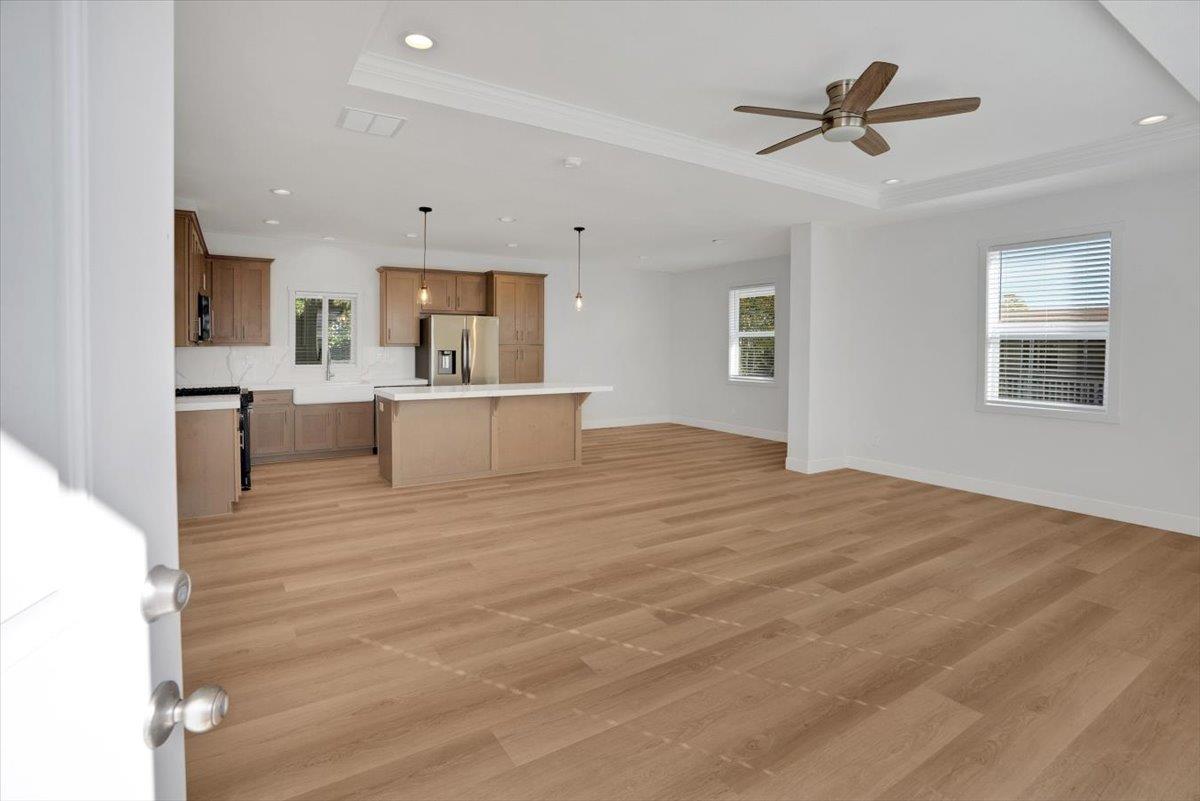144 Holm Road, Unit 55 Watsonville, CA 95076 - Photo 2 of 24 a view of kitchen and living room