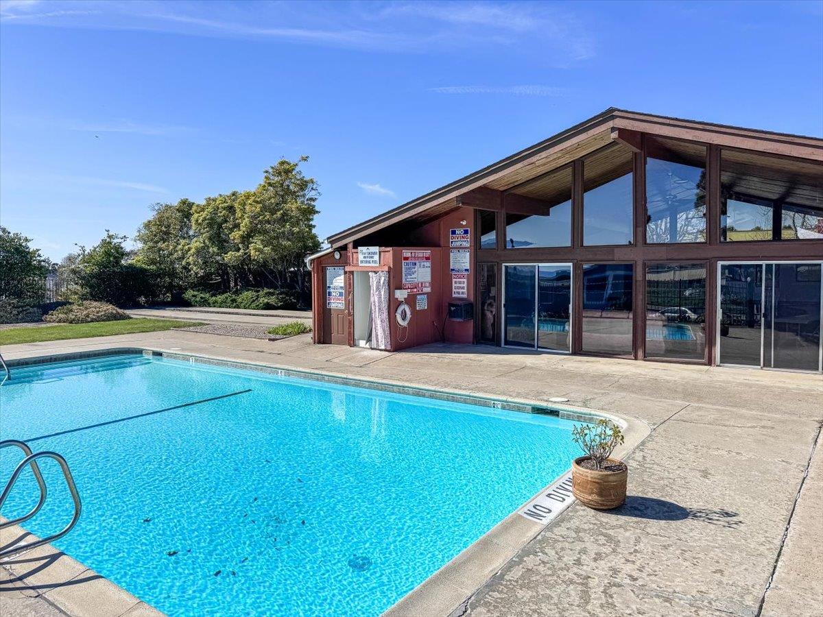 144 Holm Road, Unit 55 Watsonville, CA 95076 - Photo 24 of 24 a view of pool with outdoor seating