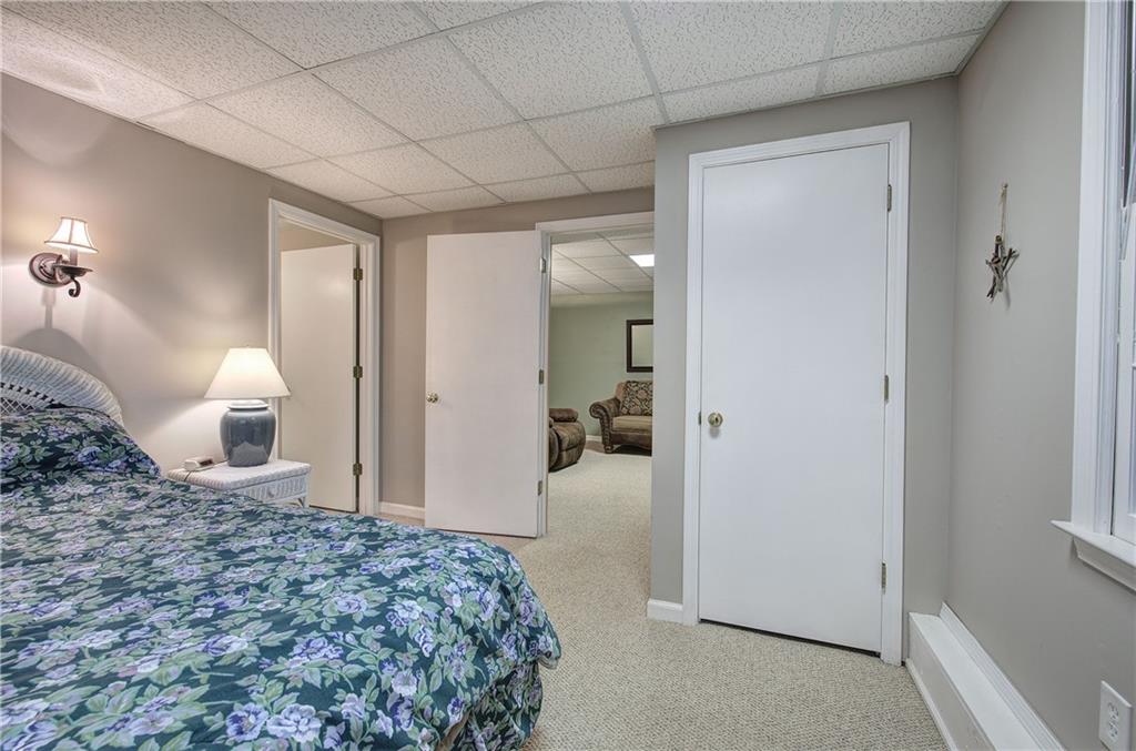 214 South View Trail Jasper, GA 30143 - Photo 34 of 72 a bedroom with a bed and a mirror