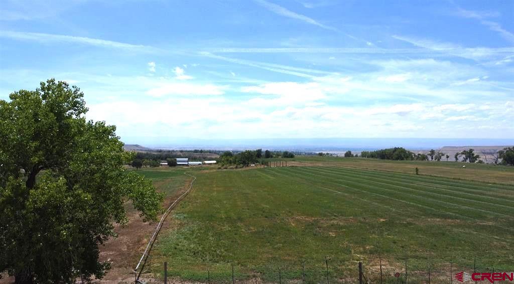 a view of an ocean and a mountain