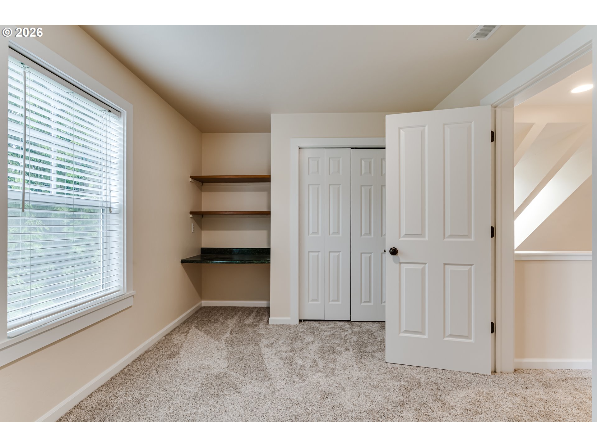 3769 Julia Loop Eugene, OR 97404 - Photo 23 of 46 a view of an empty room and a window