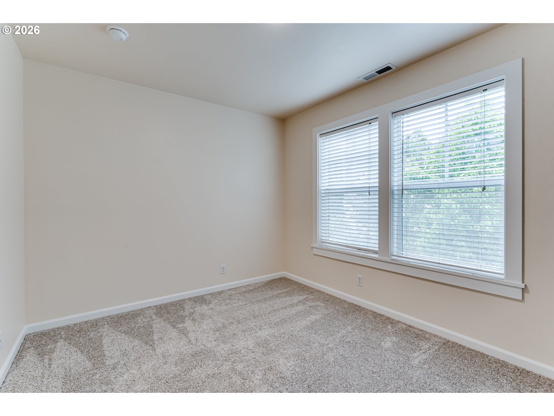 3769 Julia Loop Eugene, OR 97404 - Photo 24 of 46 a view of an empty room with a window