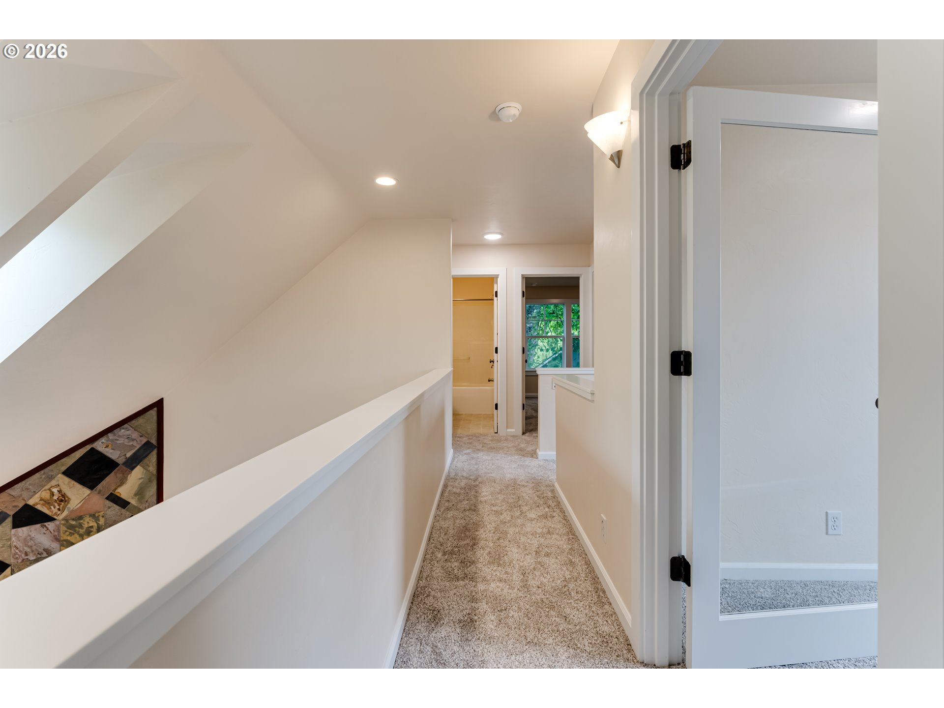 3769 Julia Loop Eugene, OR 97404 - Photo 25 of 46 a hallway with a wooden floor