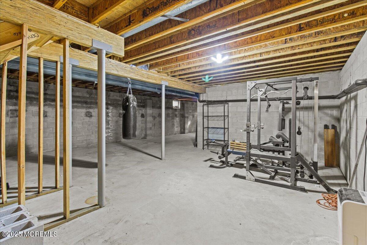 73 Porter Road Howell, NJ 07731 - Photo 19 of 65 a view of a room with gym equipment