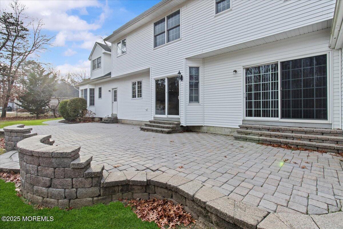73 Porter Road Howell, NJ 07731 - Photo 25 of 65 a front view of a house with a yard
