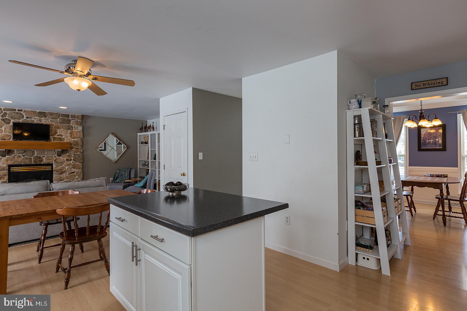 2249 Spring Valley Road Lancaster, PA 17601 - Photo 28 of 75 a view of a kitchen with granite countertop a table and chairs in it