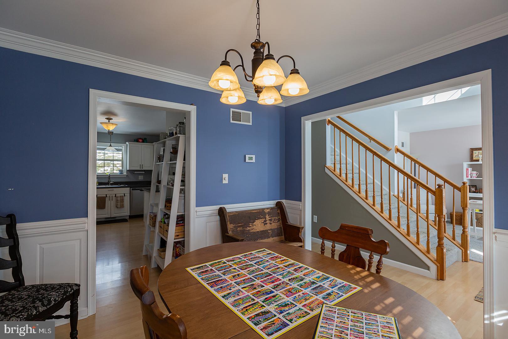 2249 Spring Valley Road Lancaster, PA 17601 - Photo 32 of 75 a bedroom with furniture and a chandelier