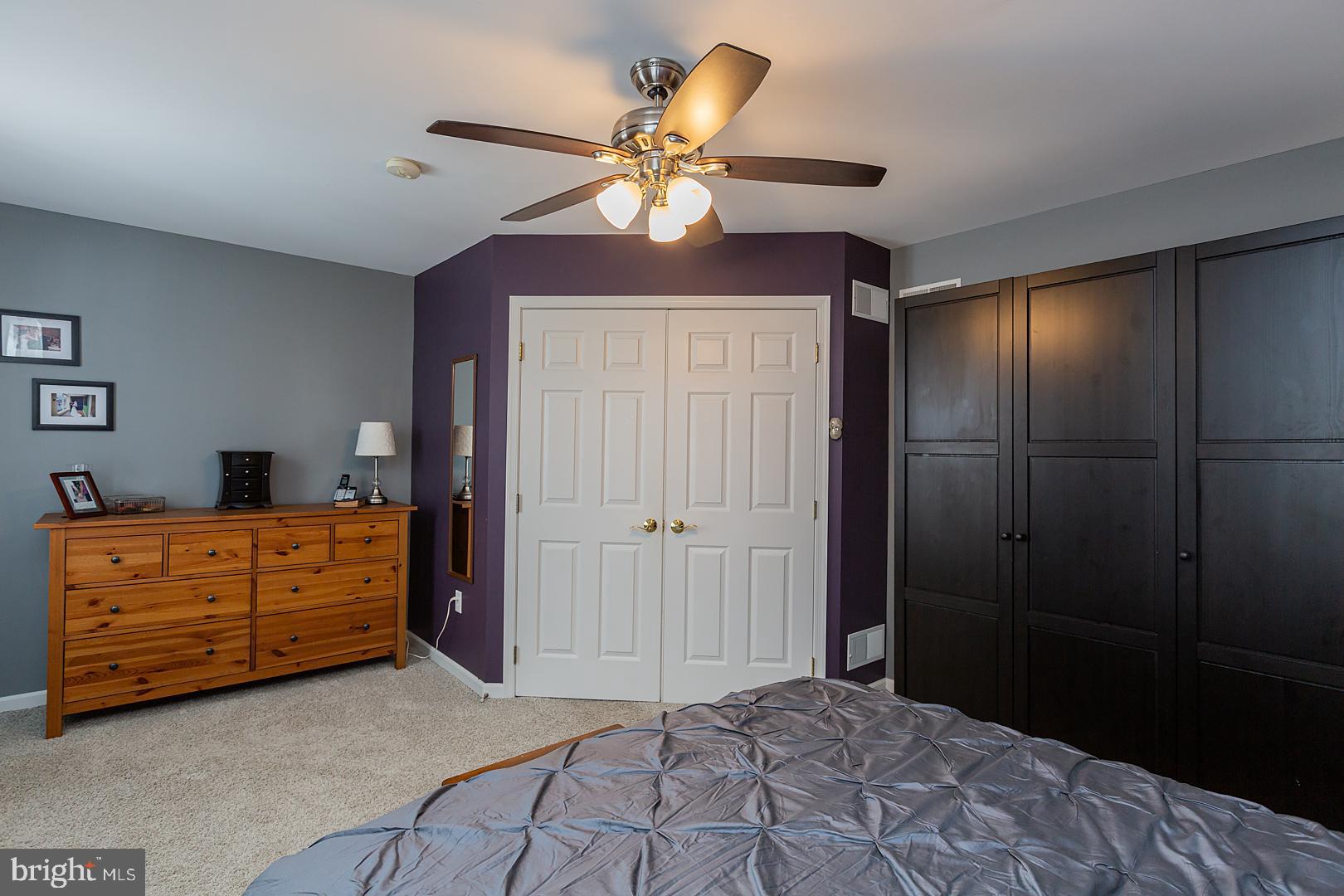 2249 Spring Valley Road Lancaster, PA 17601 - Photo 41 of 75 a bedroom with a bed and a chandelier