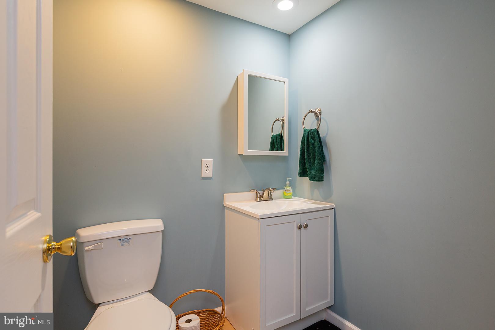 2249 Spring Valley Road Lancaster, PA 17601 - Photo 63 of 75 a bathroom with a toilet a sink and mirror
