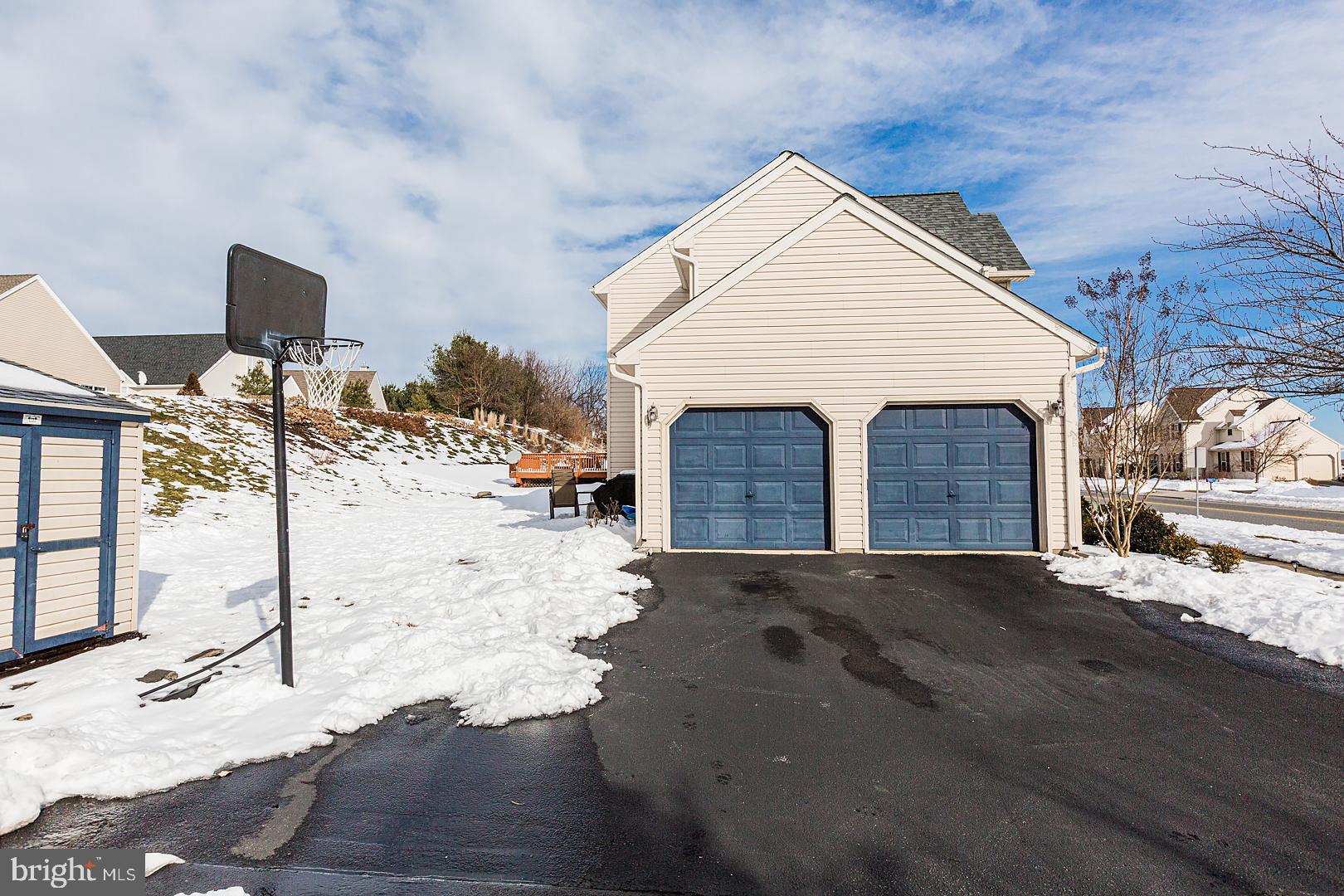 2249 Spring Valley Road Lancaster, PA 17601 - Photo 71 of 75 a view of a house with snow on the road
