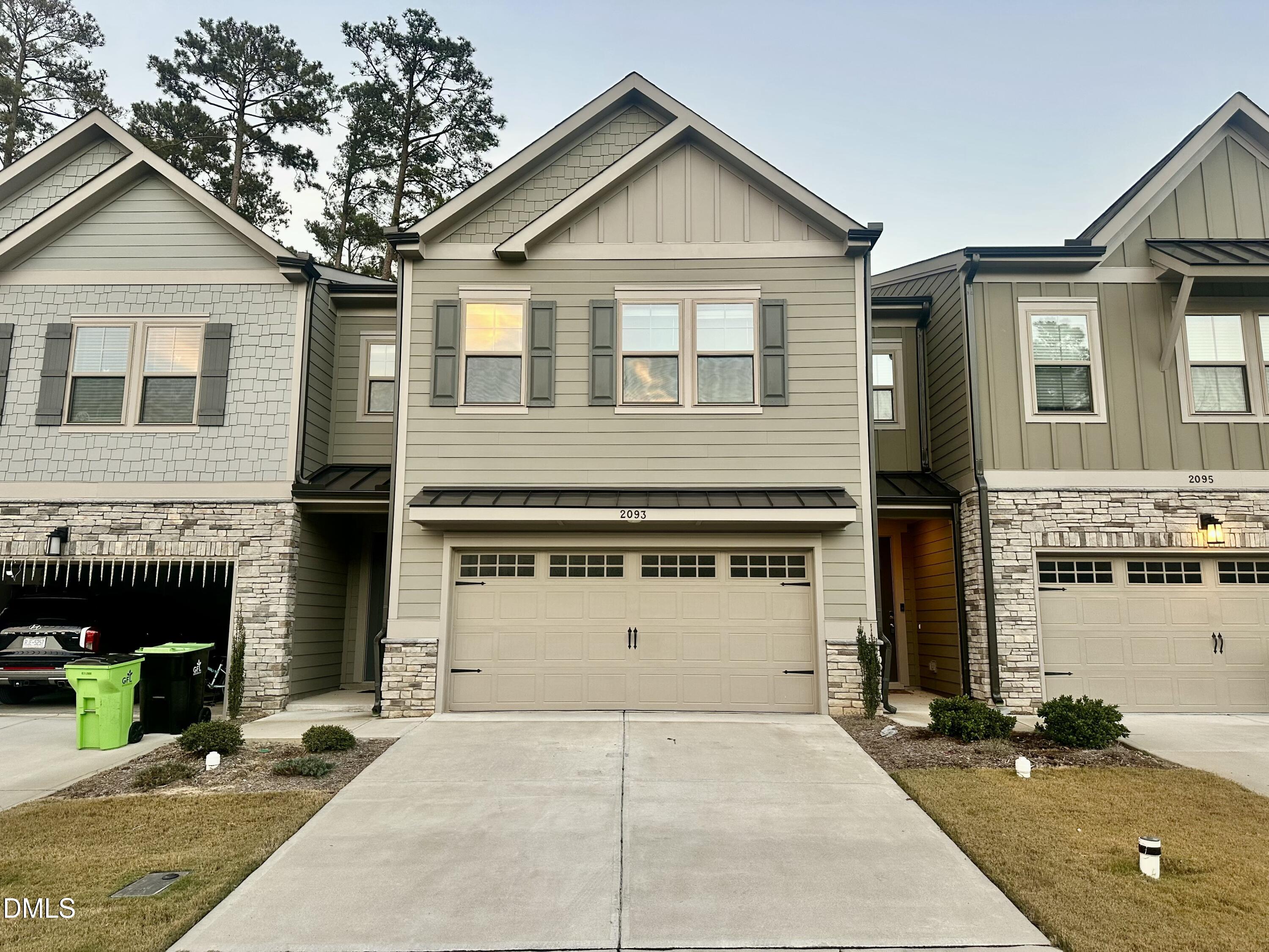 a view of a house with more windows and tree