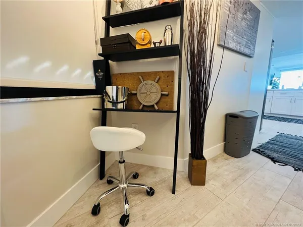 a living room with furniture and flat screen tv