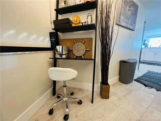 a living room with furniture and flat screen tv