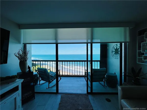 a bathroom with a toilet a sink and shower