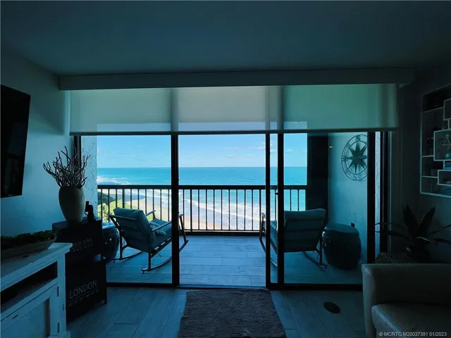 a bathroom with a toilet a sink and shower