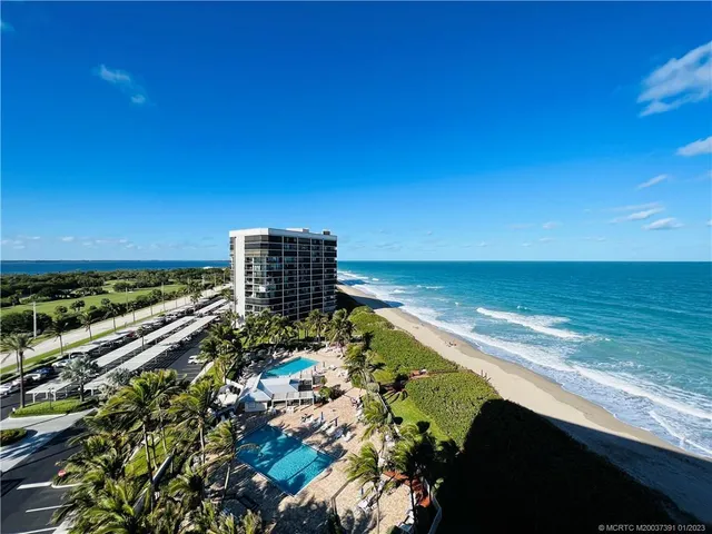 a view of a living room and bathroom