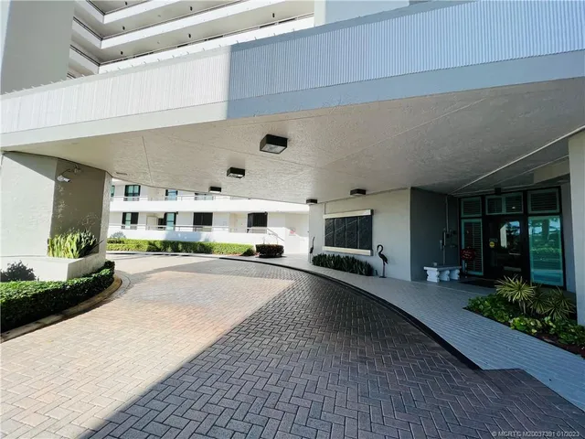 a kitchen with a table and chairs in it