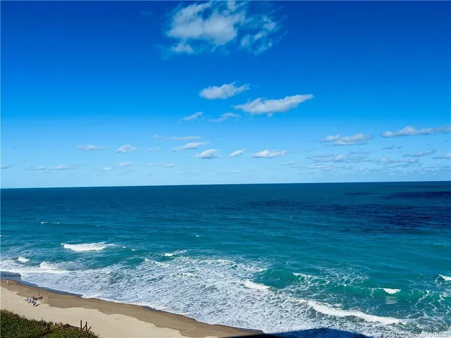 a room with furniture and wooden floor