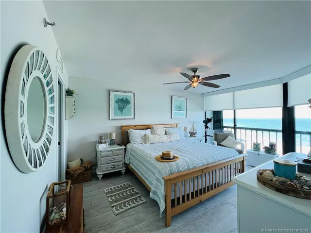 a view of multiple houses with a yard