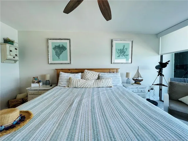 a view of a swimming pool with sitting area