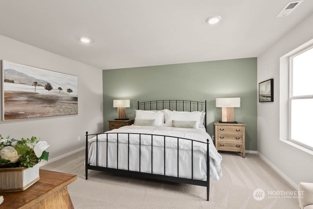 4419 228th Place South East, Unit MC18 Bothell, WA 98021 - Photo 21 of 35 a bedroom with a bed table and window