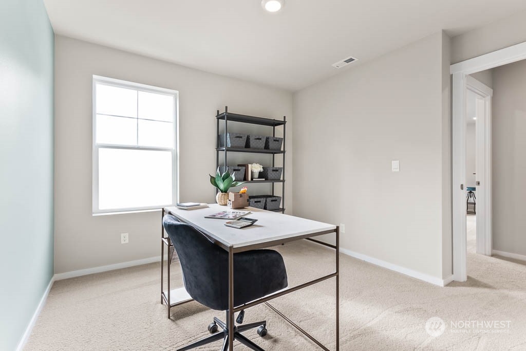 4419 228th Place South East, Unit MC18 Bothell, WA 98021 - Photo 33 of 35 a view of a workspace with furniture and window
