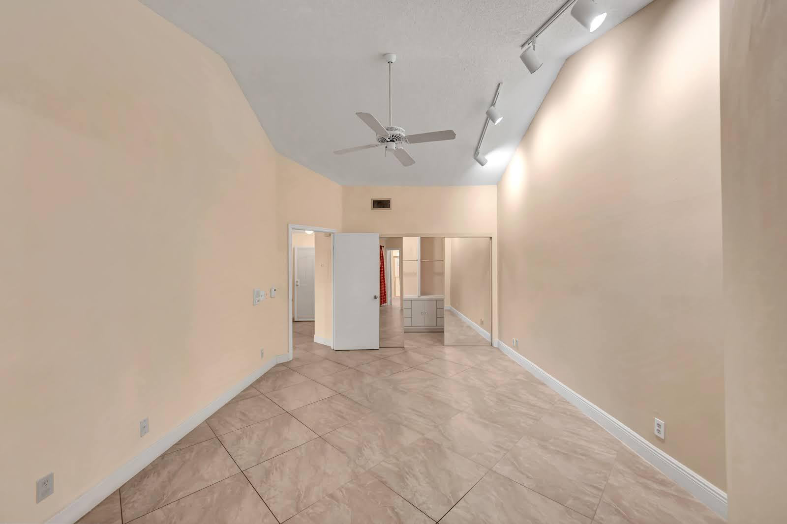 6698 Montego Bay Boulevard, Unit F Boca Raton, FL 33433 - Photo 17 of 34 RECENTLY PAINTED WHITE/PRIMARY BEDROOM