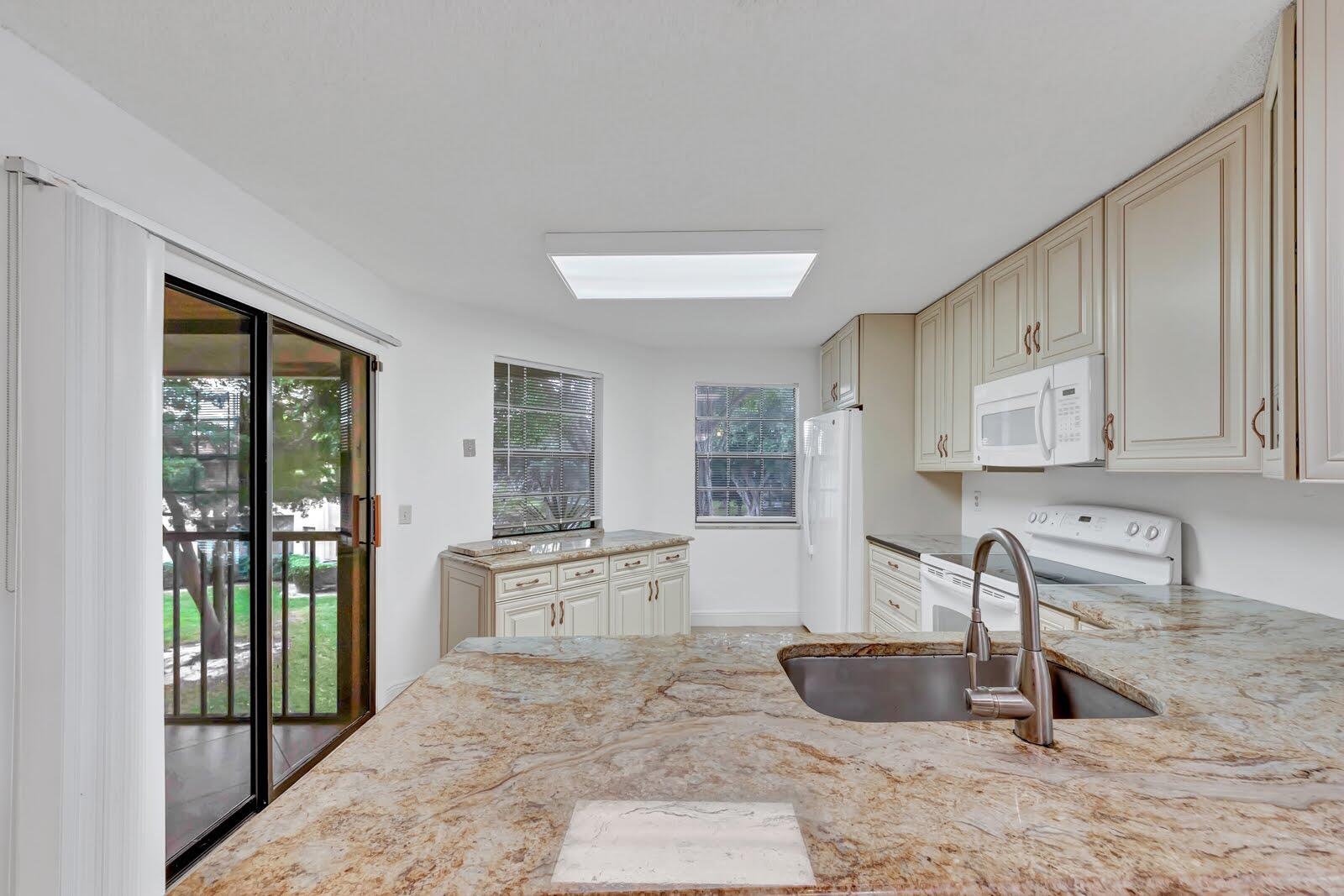 6698 Montego Bay Boulevard, Unit F Boca Raton, FL 33433 - Photo 6 of 34 KITCHEN; NEW DW & MICROWAVE