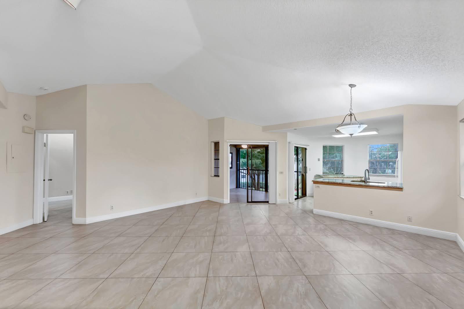 6698 Montego Bay Boulevard, Unit F Boca Raton, FL 33433 - Photo 8 of 34 SPACIOUS LIVING ROOM-DINING ROOM
