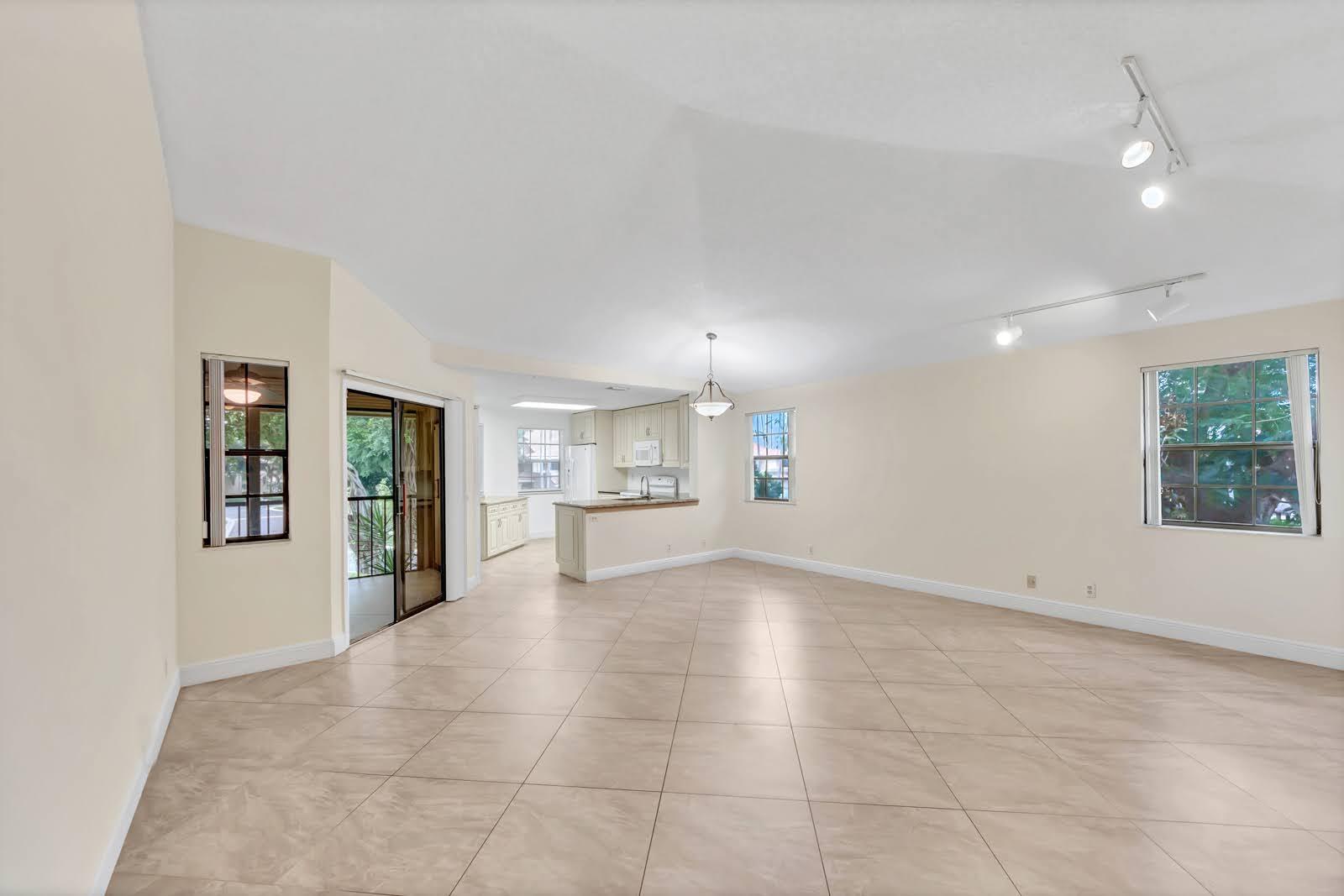 6698 Montego Bay Boulevard, Unit F Boca Raton, FL 33433 - Photo 10 of 34 RECENTLY PAINTED WHITE/LIVING ROOM