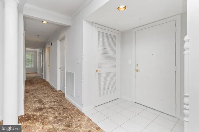 a living room with furniture a fireplace and a table