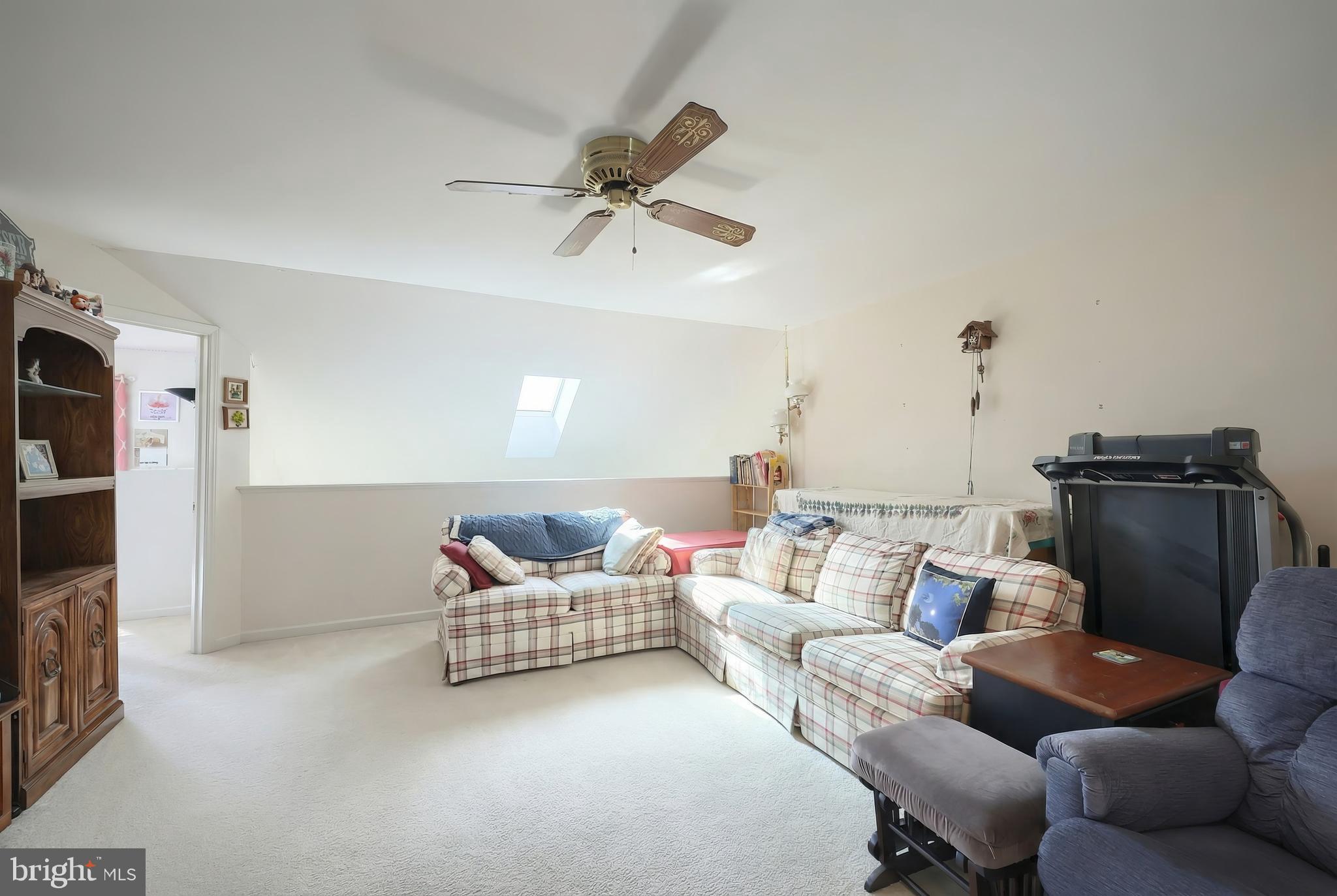 39 Spring Hill Lane Mountville, PA 17554 - Photo 20 of 28 a living room with furniture and a flat screen tv