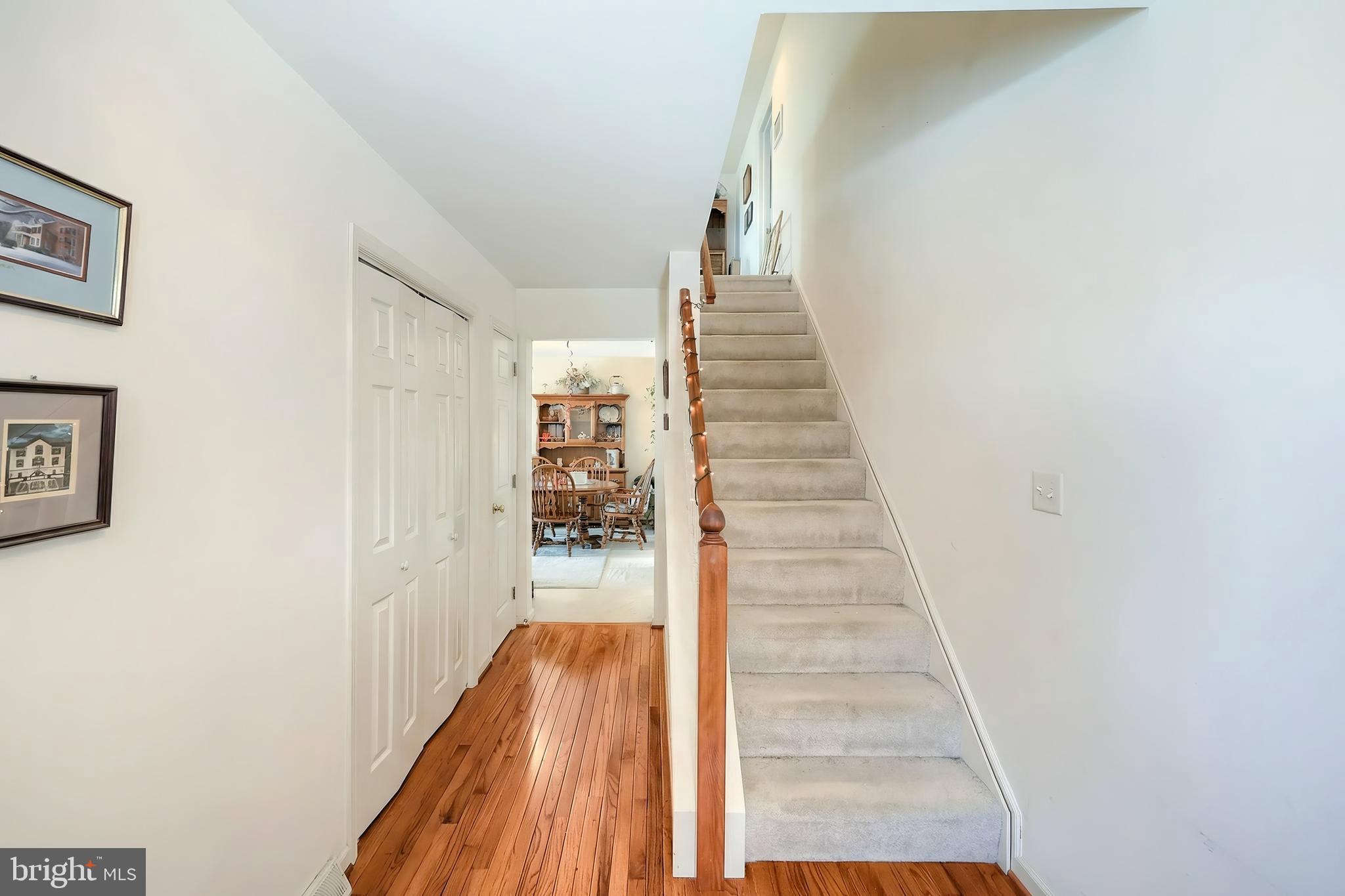 39 Spring Hill Lane Mountville, PA 17554 - Photo 4 of 28 a view of a room with wooden floor and stairs