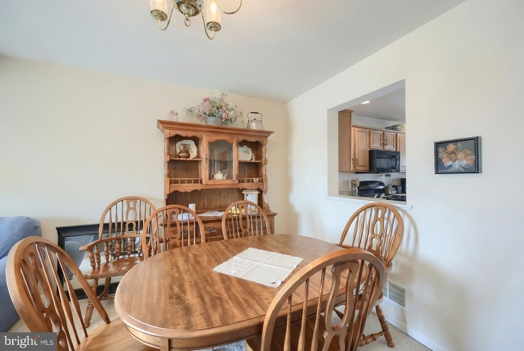 39 Spring Hill Lane Mountville, PA 17554 - Photo 6 of 28 a dining room with furniture a window and wooden floor