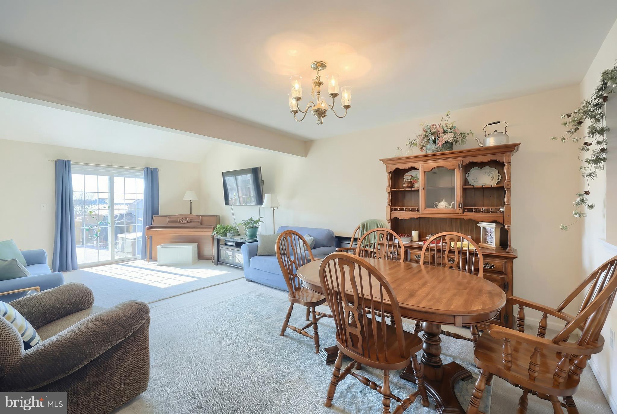 39 Spring Hill Lane Mountville, PA 17554 - Photo 7 of 28 a dining room with furniture a livingroom and chandelier