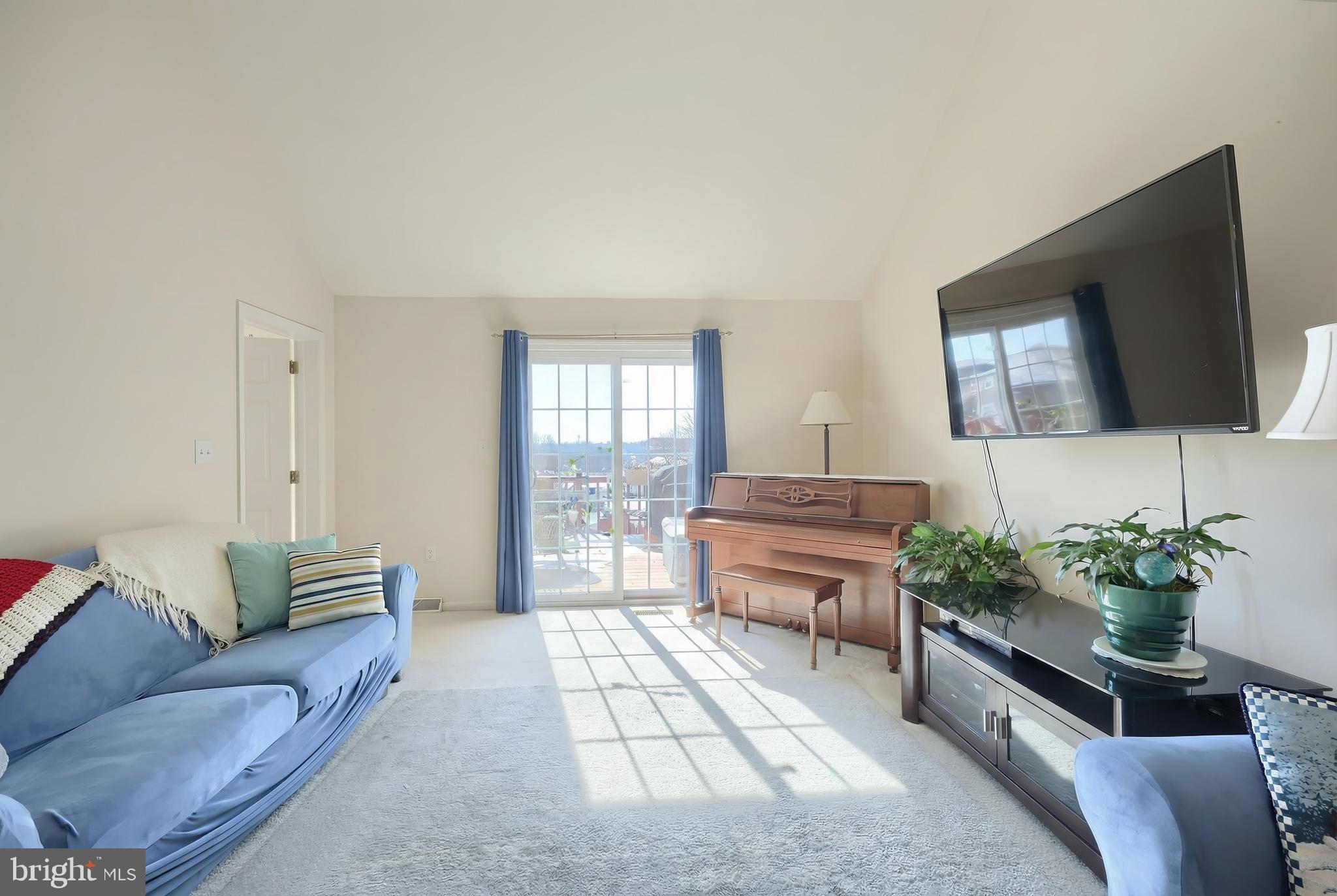 39 Spring Hill Lane Mountville, PA 17554 - Photo 8 of 28 a living room with furniture and a flat screen tv