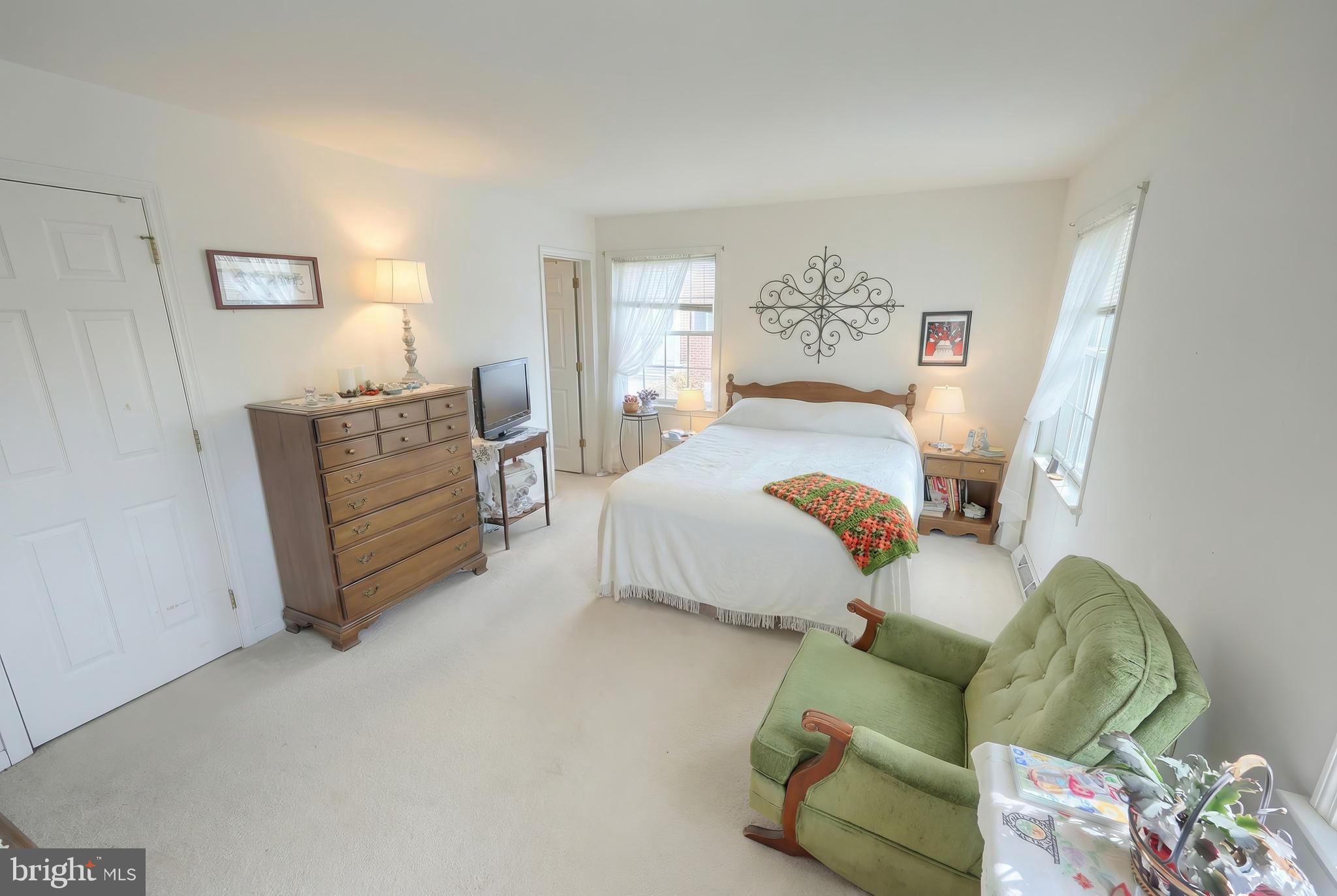 39 Spring Hill Lane Mountville, PA 17554 - Photo 10 of 28 a spacious bedroom with a bed and window