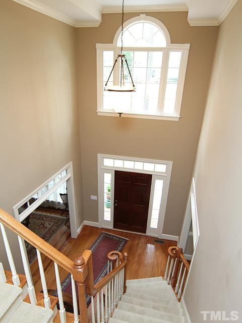 236 Release Circle Raleigh, NC 27615 - Photo 2 of 25 a bedroom with bed and a window