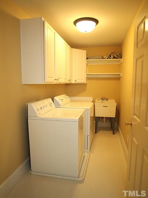 236 Release Circle Raleigh, NC 27615 - Photo 12 of 25 a utility room with dryer and washer