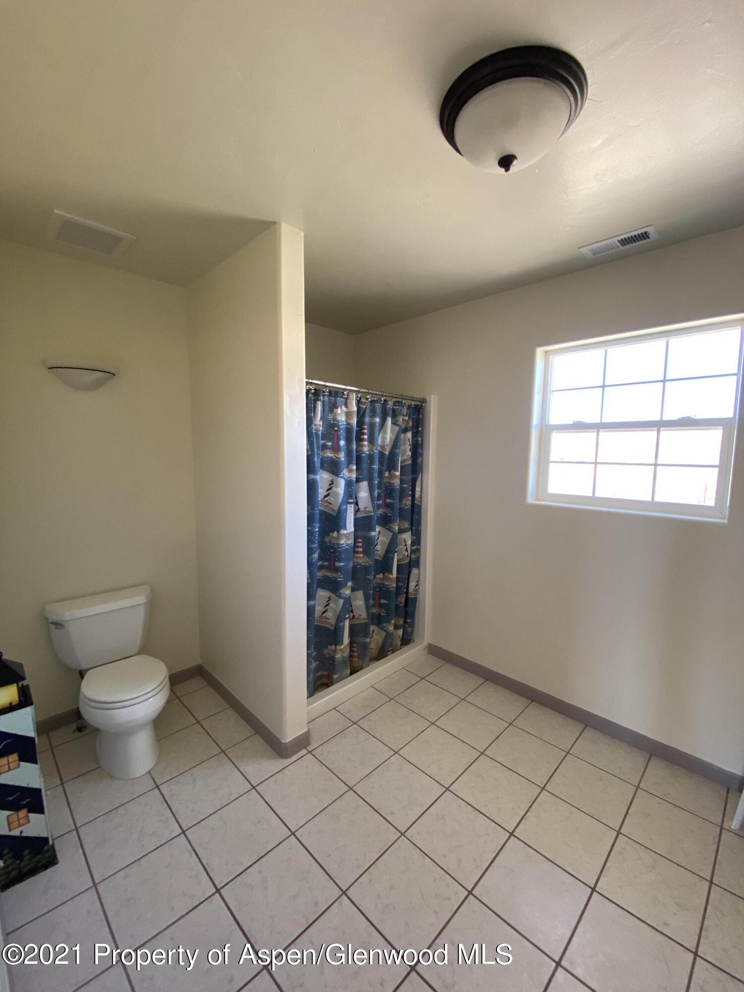 658 Cindys Way Rifle, CO 81650 - Photo 19 of 30 a bathroom with a toilet