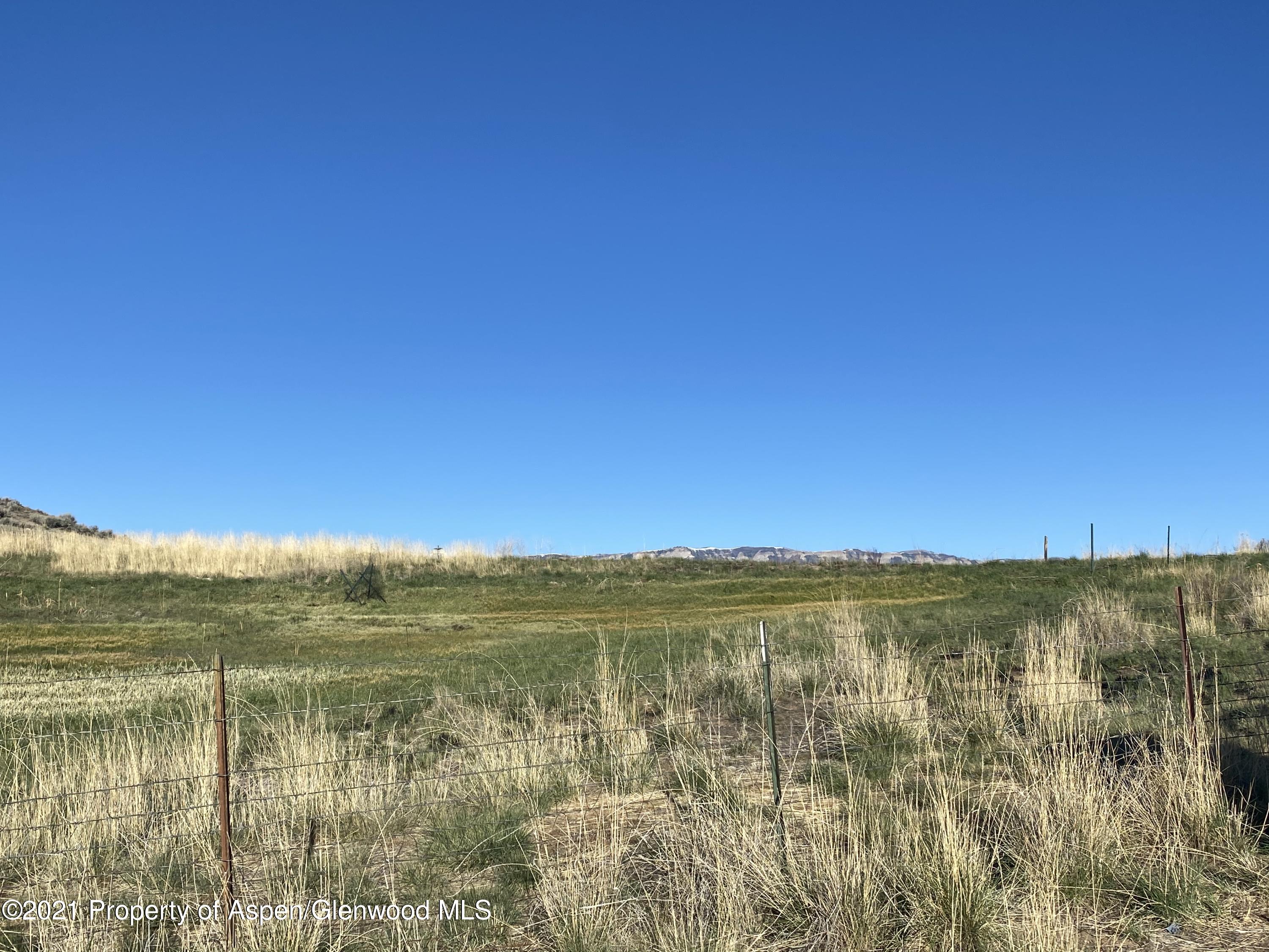 658 Cindys Way Rifle, CO 81650 - Photo 26 of 30 a view of lake with mountain