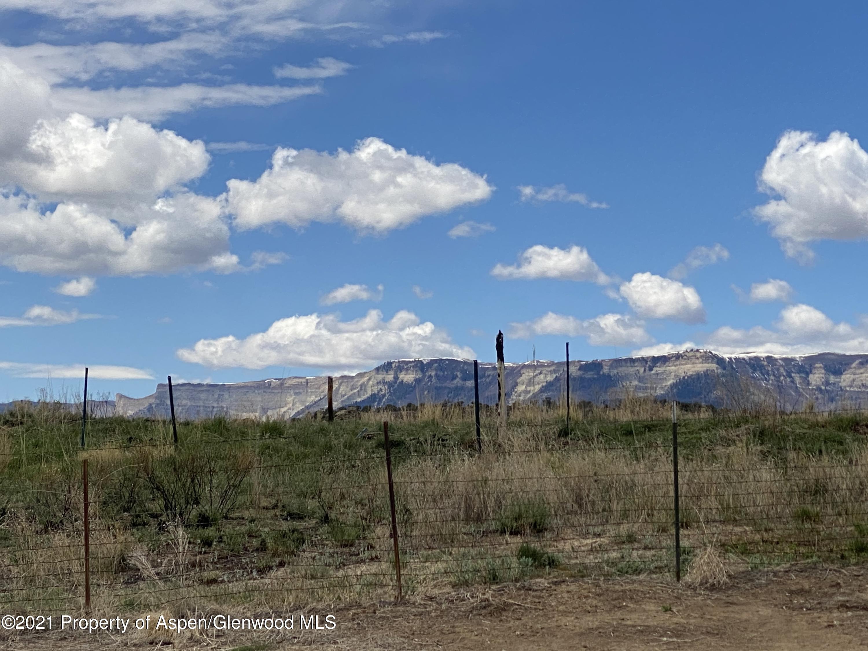 658 Cindys Way Rifle, CO 81650 - Photo 27 of 30 a view of a lake in middle of forest