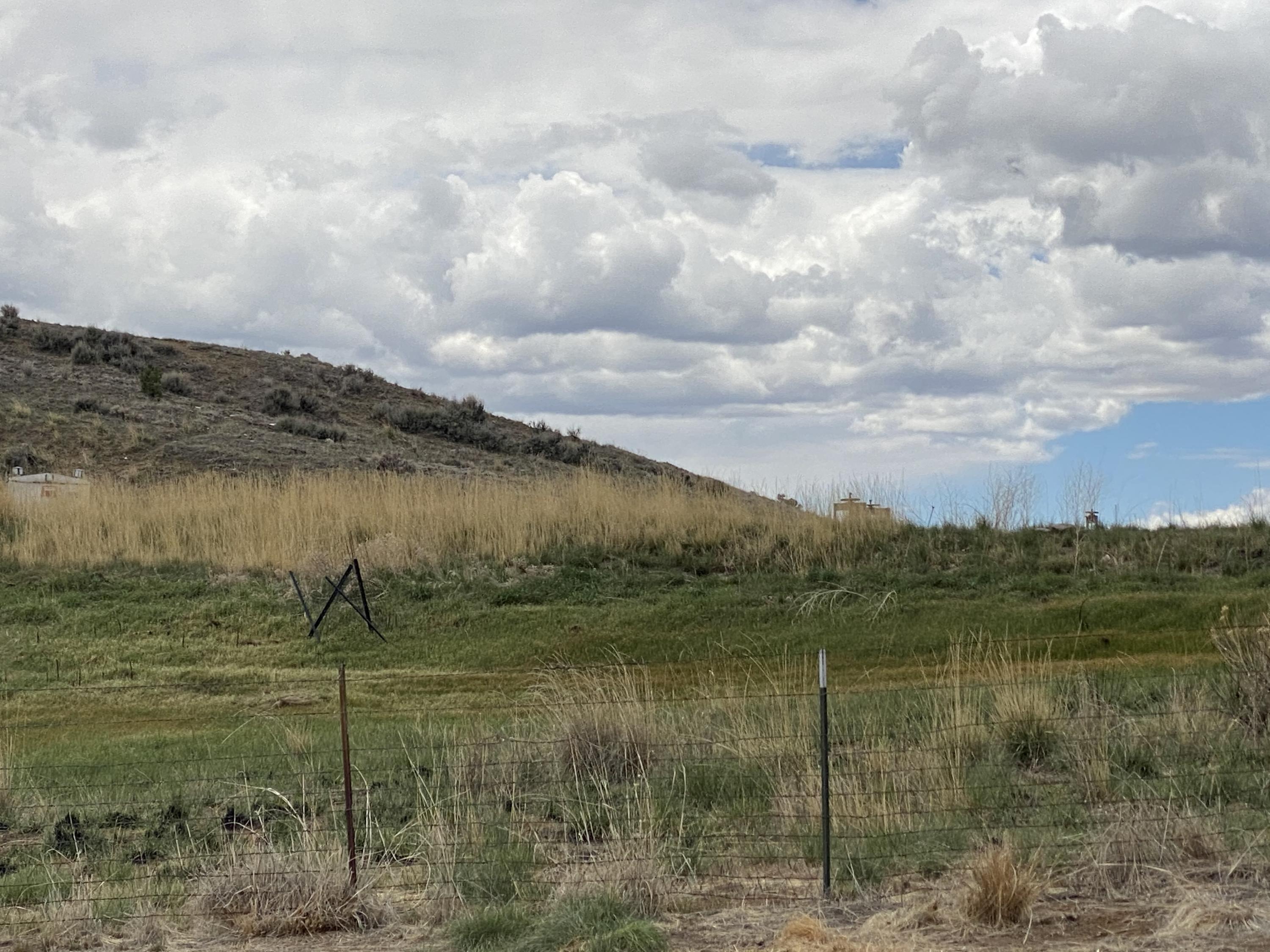 658 Cindys Way Rifle, CO 81650 - Photo 28 of 30 a view of a lake from a yard