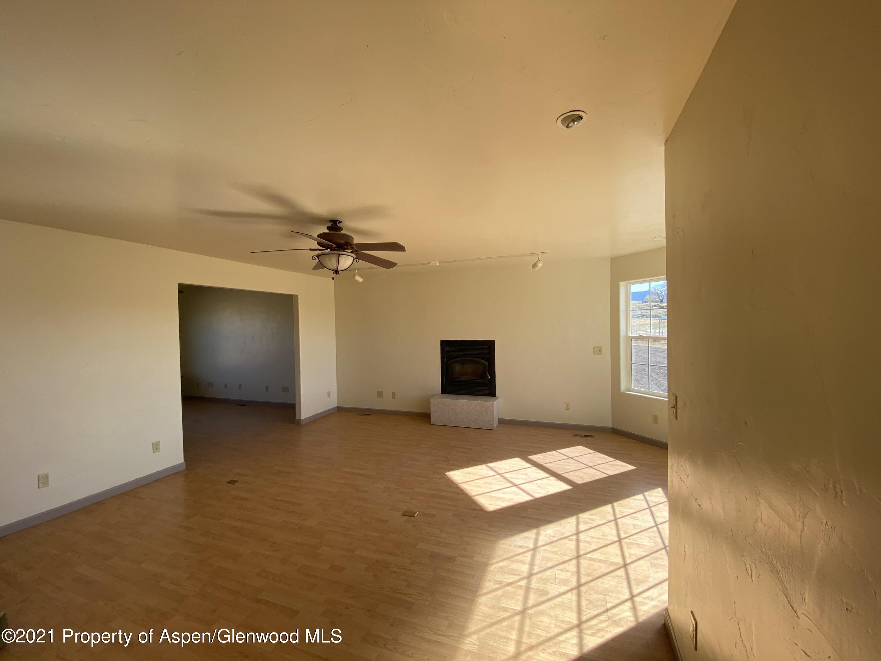 658 Cindys Way Rifle, CO 81650 - Photo 7 of 30 a view of a livingroom with a fireplace